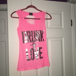 Bright pink tank top with cutouts on the back